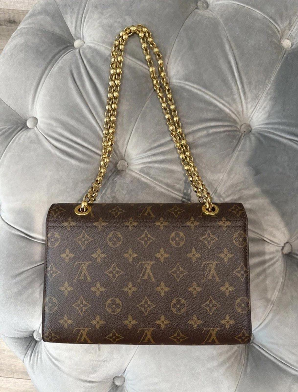 Louis Vuitton Monogram Victoire Bijou Adjustable Strap Leather Hand Bag Purse