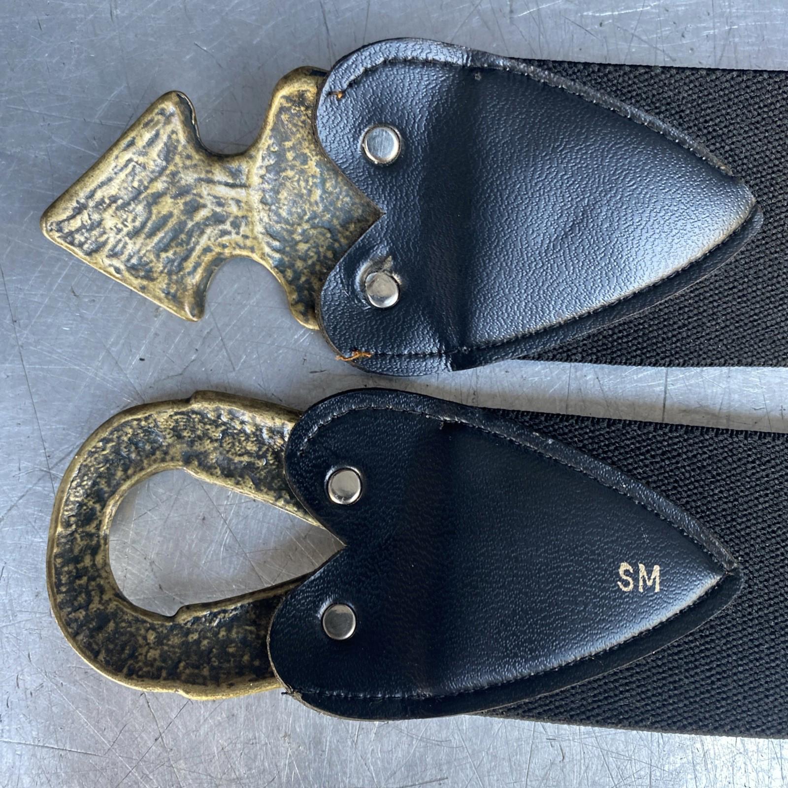 VTG 1980-90’s Omega leopard-print stretch belt with an arrowhead buckle Size S/M